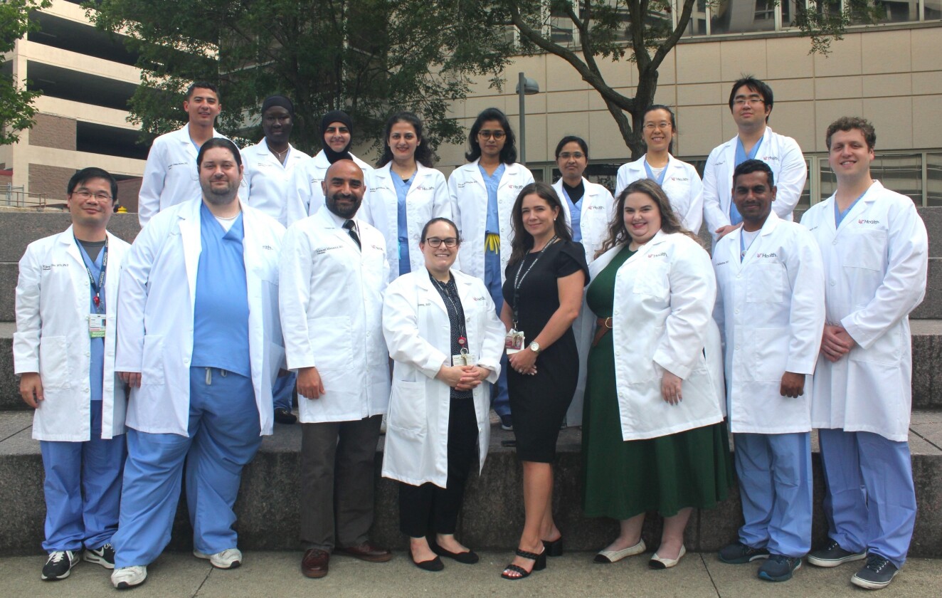 2023.2024 Residents New resident photo with all 12 residents and program leadership